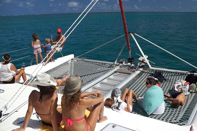 Catamaran Adventure Full Day: Ile aux cerfs,GRSE Waterfall,Snorkeling &BBQ Lunch - Life aboard the catamaran