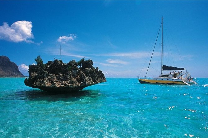 Catamaran Cruise to Ile Aux Bénitiers: Dolphin watch, Crystal Rock & Transfer - The early pickup and ride to Rivière Noire