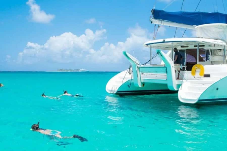 Catamaran trip to Ile Aux Cerfs With Two Way Transportation - Boarding a catamaran with room for 40