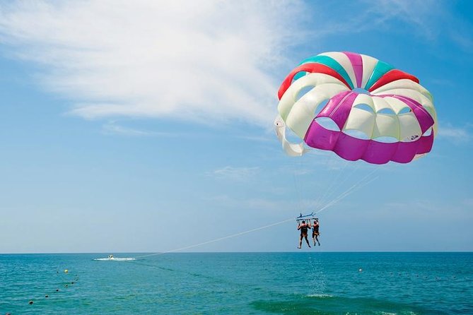 Ile aux Cerf: Speed boat with Parasailing & Tube Riding and Lunch - Tube riding for the day’s biggest splash