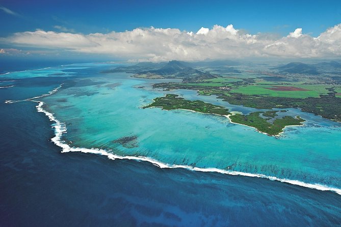 Marvelous Ile aux Cerf island: Speed Boat, Parasailing, Lunch & GRSE waterfall - Parasailing over the lagoon