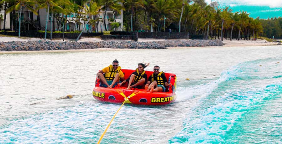 Mauritius: Watersport Adventure Day with Lunch and Pickup - Pickup, language, and what to bring