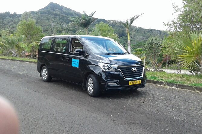 Private Luxury Minibus Transfer from Mauritius Airport to City - Finding your driver near Exit Gate 7