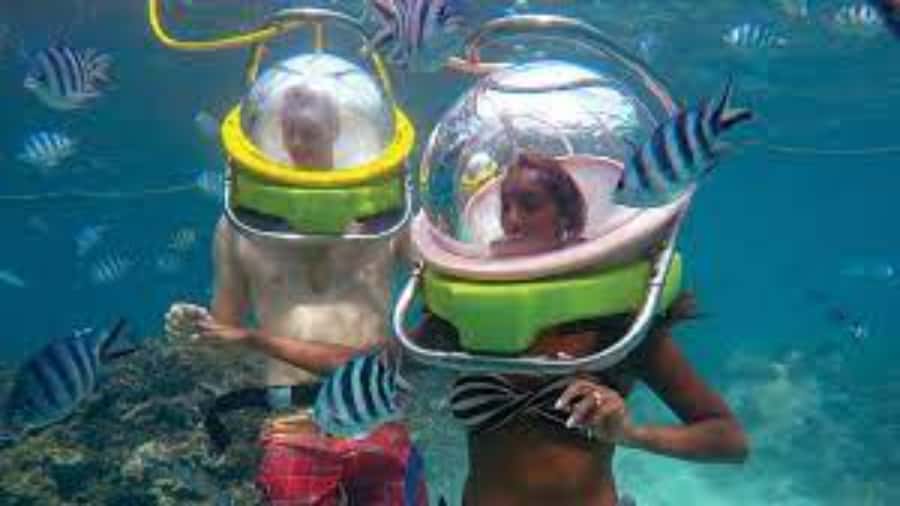 Walking under the sea in Mauritius with transfer - The safety briefing and helmet setup
